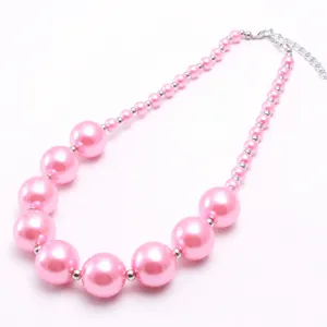 Pink chunky pearl beaded necklace for kids, cute DIY fashion statement jewelry accessory detail.