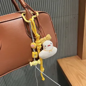 Cute cartoon plush duck bag charm keychain, yellow braided strap and letter beads pendant.