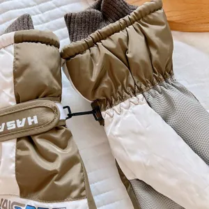 Close-up of winter thermal ski gloves for men, waterproof and windproof with plush lining.