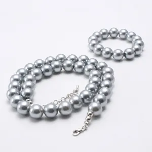 Grey faux pearl children necklace and bracelet jewelry set with metal clasp and extension chain.