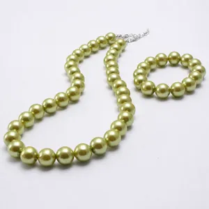 Light green faux pearl necklace and bracelet set, elegant beaded jewelry for women and kids.