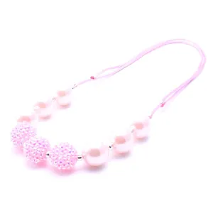 Pink rhinestone children necklace with pearls and adjustable cord for girls sweet jewelry detail.