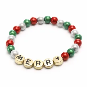 Christmas beaded bracelet detail view, colorful red green silver and gold MERRY letter beads.