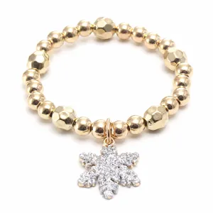 Gold beaded children bracelet with sparkling glitter snowflake pendant for christmas party
