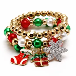 Christmas beaded bracelet set with cute stocking and snowflake charms for kids, gold red green