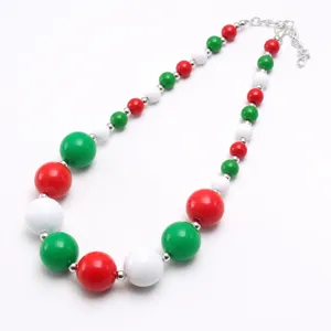 Colorful acrylic bead chunky necklace detail, red green and white kids jewelry accessory.