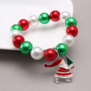 Christmas children pearl beaded bracelet detail view, colorful beads with Santa pendant