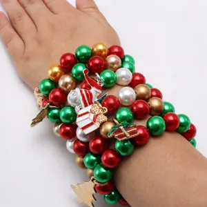 Festive Christmas pearl beaded bracelet for kids featuring cute holiday charms and stylish design.