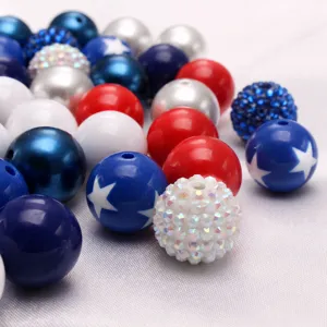 Detailed view of mixed 20mm acrylic chunky beads in patriotic red white and blue with stars.
