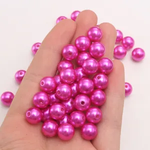 Perles d'imitation en plastique ABS rose fuchsia pour la fabrication de bijoux DIY.