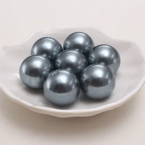 Dark grey ABS plastic imitation pearl beads detail showing smooth round loose DIY craft beads.