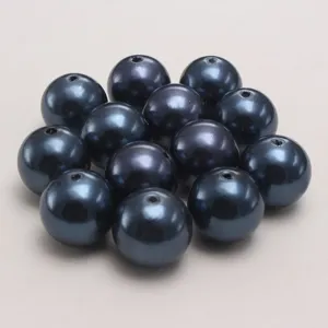 Dark blue ABS plastic imitation pearl loose beads for DIY jewelry making and crafting detail shot.