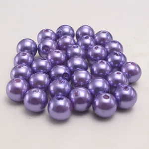 Purple ABS plastic faux pearl loose beads for DIY jewelry making crafts detail view.
