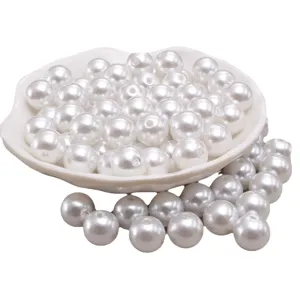 Perles d'imitation en plastique ABS blanc pour la creation de bijoux artisanaux DIY.