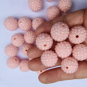 Pink resin rhinestone bubblegum chunky beads for DIY jewelry making and crafts design.