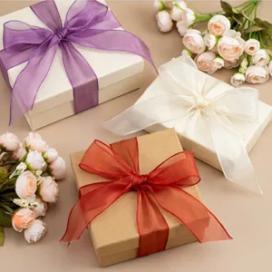 Gift box packaging organza ribbon set with decorative flowers, perfect for DIY bow crafts.