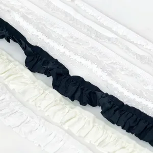 Detailed view of various ruffle lace ribbons and chiffon tapes for DIY and crafts