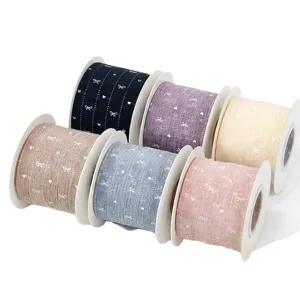 Colorful bow heart print ribbon rolls for gift wrapping, baking packaging and DIY crafts.