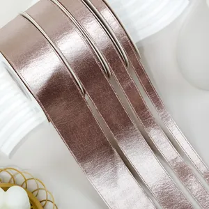 Double-sided metallic shiny pink velvet ribbon satin tape for DIY hair bows and garment accessories.