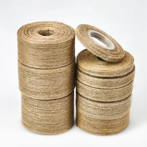 Natural jute twine ribbon rolls for handmade DIY crafts and rustic wedding decorations.