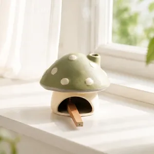 Ceramic mushroom incense burner for home decor, cute desktop aromatherapy diffuser piece.