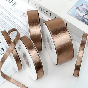 Dark brown double-sided glossy satin ribbon rolls in various widths for DIY bows and hair accessories.