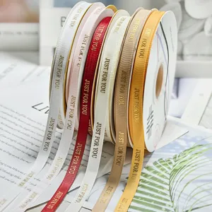 1cm gold stamped grosgrain ribbon for gift wrapping, flower bouquet packaging, and cake boxes.