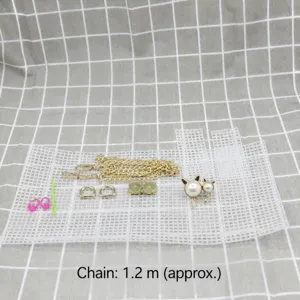 Kit per la creazione di borse DIY con rete in plastica, catena dorata e accessori gatto.