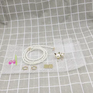 Kit di materiale per borsa fai da te con catena di perle, anello D e chiusura magnetica.
