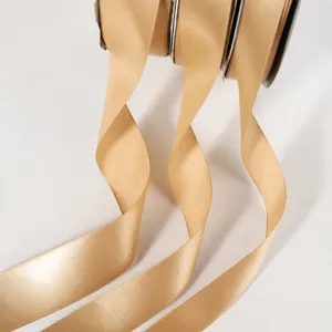 Champagne gold satin ribbon for gift wrapping, wedding decor, and floral design crafts.