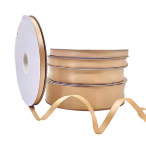 Gold champagne satin ribbon rolls for gift wrapping, floral decoration, and holiday crafts.