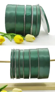 Dark green satin ribbon detail closeup, smooth polyester fabric for gift wrapping and bows.