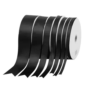 Set de rollos de cinta de raso negro para envolver regalos y lazos de pelo en varios anchos.