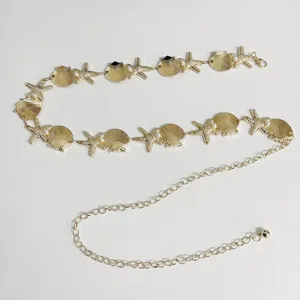 Exquisite gold metal waist chain featuring seashell and starfish charms with pearls.