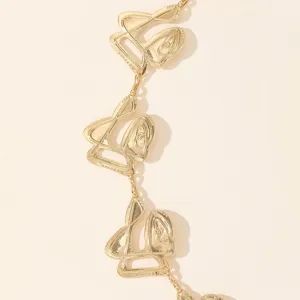 Gold metal chain link detail, rhinestone embellished abstract artistic script design, elegant.