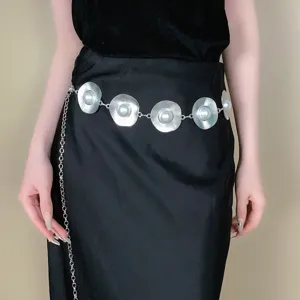 Silver metal waist chain with pearl accents, fashionable geometric design for dresses jeans.