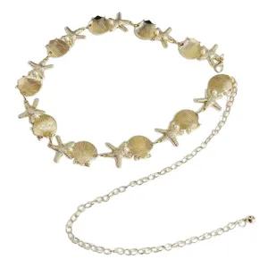 Gold metal waist chain featuring seashell and starfish charms with pearls for women.