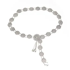 Silver metal waist chain with vintage filigree round discs and tassel pendant for women.
