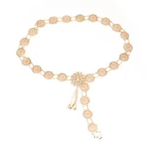 Gold metal coin waist chain bohemian belly chain with floral flower pendant detail and charm dangle.
