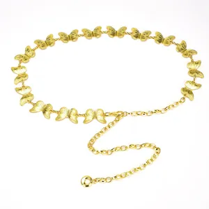 Gold butterfly metal chain belt detail shot, delicate link design for women's fashion.