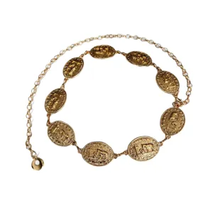 Exquisite gold metal waist chain with embossed coin pendants, vintage retro belt design for women.