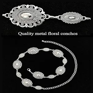 Detailed view of vintage bohemian silver metal floral concho waist chain belt accessories.