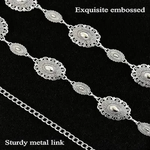 Detailed shot of retro silver metal waist chain with exquisite embossed floral links for dresses.