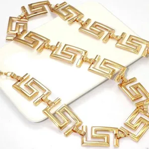 Goldene geometrische Metall-Taille Kette, eleganter griechischer Muster Taillengürtel.