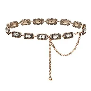 Vintage distressed metal waist chain detail, ornate crystal rhinestone links and hanging chains.