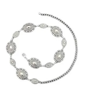 Vintage bohemian metal waist chain with exquisite hollow carved floral disc design for women dresses.