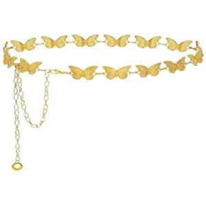 Vue détail de chaîne de taille papillon en métal doré, accessoire élégant pour robe.