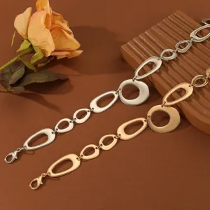 Detailed view of women metal waist chain featuring interlocking oval and round rings design.