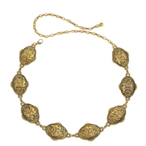 Detailed view of the vintage gold metal waist chain with elegant carved oval medallions and links.