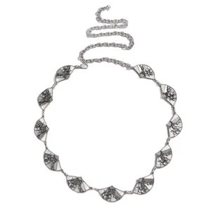 Silver metal waist chain with delicate fan charms and floral motifs for chic antique outfits.